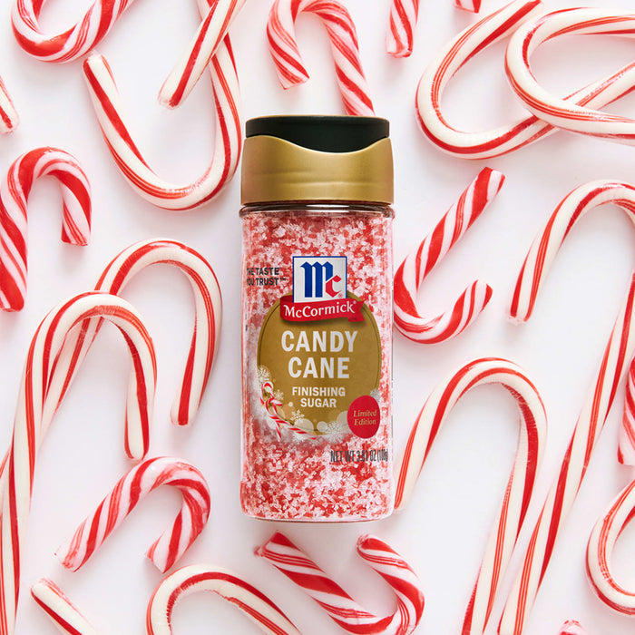This image shows a recipe for Candy Cane Bark using McCormick Candy Cane Finishing Sugar, with a preparation time of 20 minutes and yielding 12 servings.
