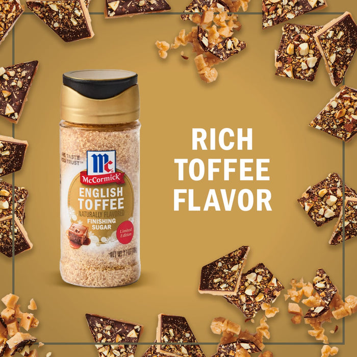 A bottle of McCormick English Toffee Seasoning is surrounded by pieces of toffee, highlighting its rich toffee flavor.