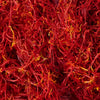 A close-up view of vibrant red saffron threads.