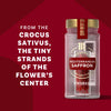 A jar of Mccormick Gourmet Saffron 0.035 Oz is shown with text explaining saffron comes from the tiny strands of the Crocus Sativus flowers center, all on a red background.