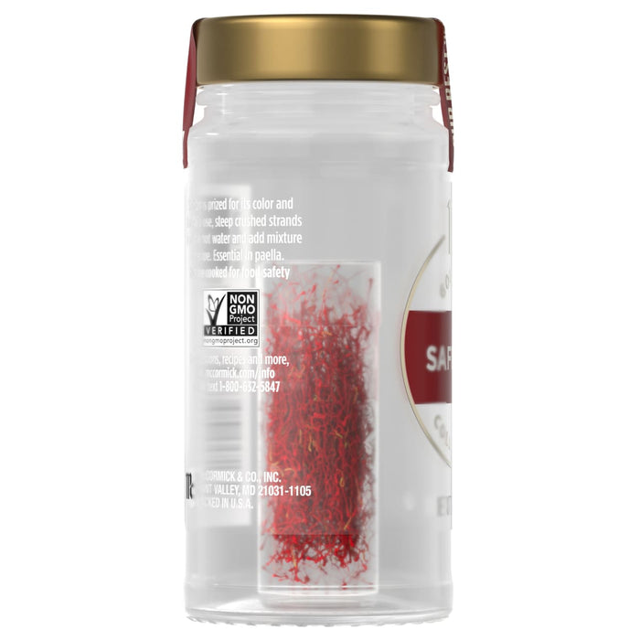 The back of a jar of Mccormick Gourmet Saffron Seasoning Whole .035 Oz shows the vibrant red saffron threads inside, along with the Non-GMO Project Verified seal and company contact information.