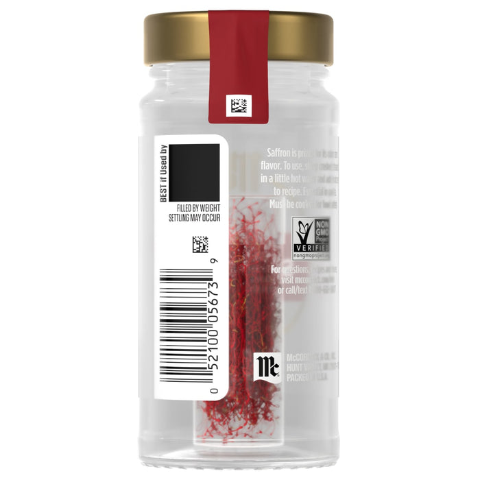 The back of a clear glass jar of Mccormick Gourmet Saffron Seasoning Whole .035 Oz displays the product information and barcode.
