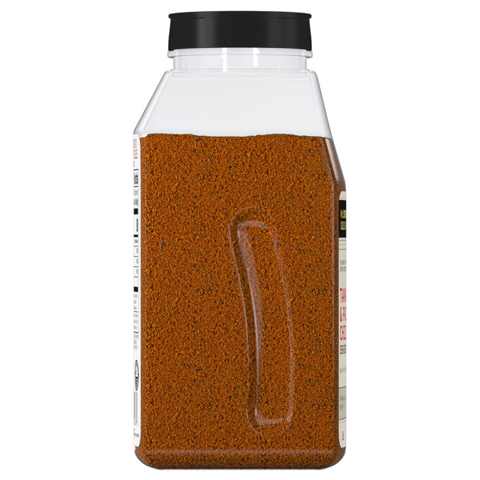 ['A glass jar of McCormick Grill Mates Tampa &amp;  P&amp; Chili Seasoning.']