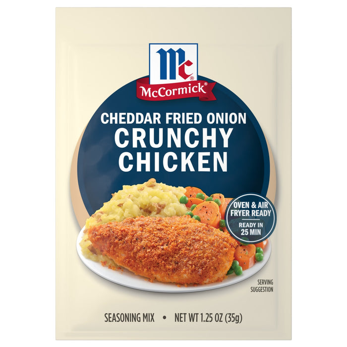McCormick Cheddar Fried Onion Crunchy Chicken seasoning mix package with a serving suggestion of chicken, mashed potatoes and broccoli.