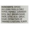 ['A list of ingredients for a spice blend, including pasilla chile pepper, paprika, coriander seed, salt, brown sugar, onion, citric acid, garlic, sugar, extractives of tamarind and natural flavor.']