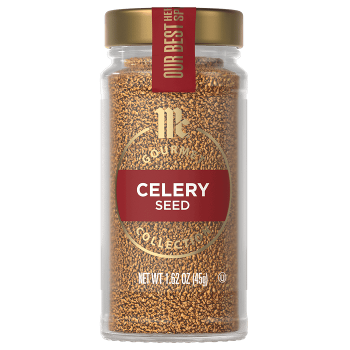 A glass jar of McCormick Gourmet Celery Seed.