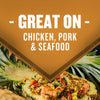 A pineapple filled with rice and grilled shrimp is featured with the text Great on Chicken Pork &amp; Seafood overlaid on a brown banner.