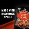 A package of McCormick Grill Mates Asian BBQ 15 Minute Marinade Mix, made with McCormick spices.
