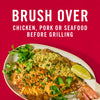 A plate of grilled fish with a green sauce and cilantro with the text Brush over chicken pork or seafood before grilling above it.