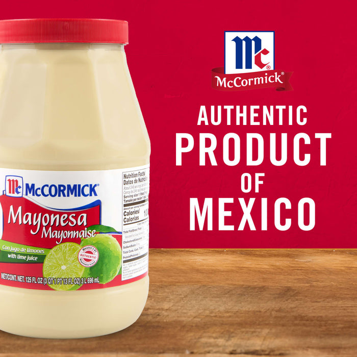 ['A jar of McCormick Mayonesa Mayonnaise with a red lid and a lime wedge on the label.']
