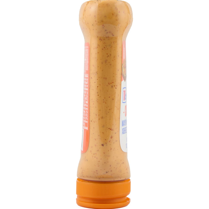 ['A side view of a bottle of McCormick Garlic Parmesan Dressing.']