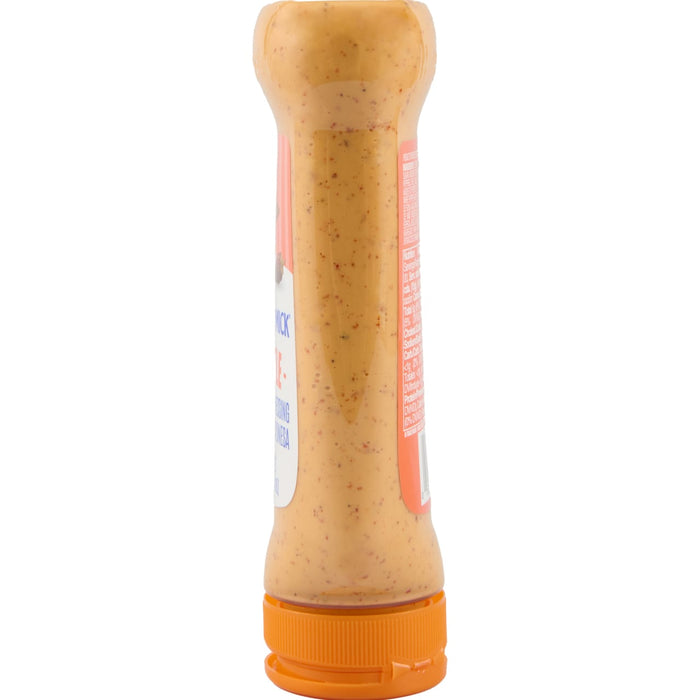 ['A bottle of McCormick Spicy Chipotle Dressing and Marinade.']