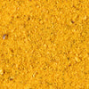 ['A close-up of yellow seasoning.']