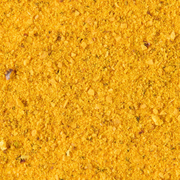 ['A close-up of yellow seasoning.']