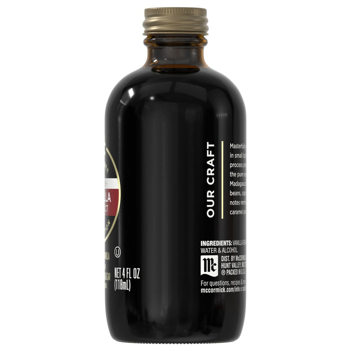 A bottle of McCormick Gourmet Pure Vanilla Extract.