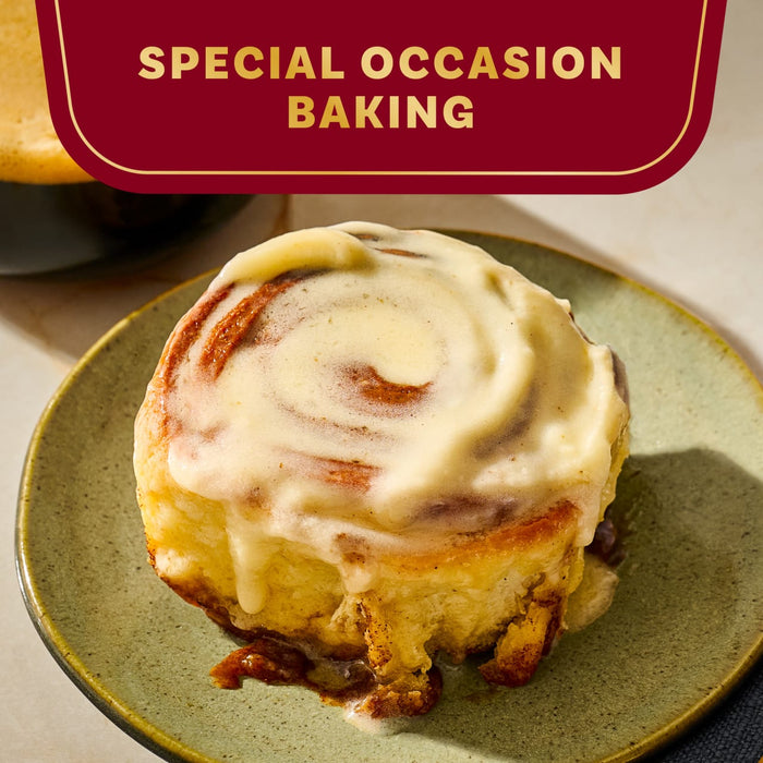 A frosted cinnamon roll on a plate, featured under the heading Special Occasion Baking.