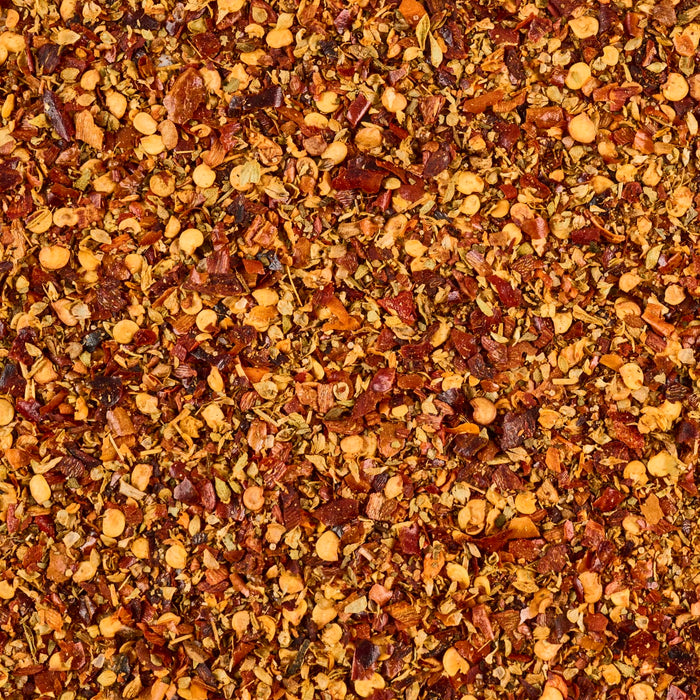 ['A close-up of a mixture of dried herbs and spices.']
