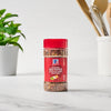['A bottle of McCormick Crushed Red Pepper &amp; Italian Herbs Seasoning.']