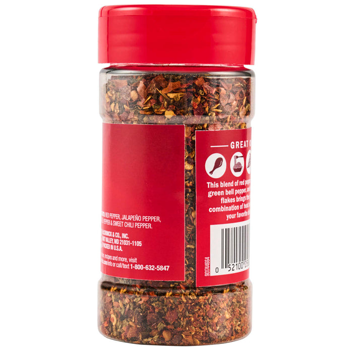 ["A glass jar of McCormick's Great Onion seasoning."]