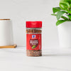 ['A jar of McCormick Red &amp; Green Pepper Blend.']