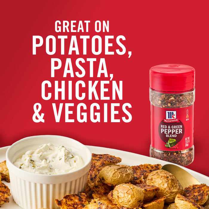 ['A jar of McCormick Red &amp; Green Pepper Blend with a bowl of potatoes and a dip.']