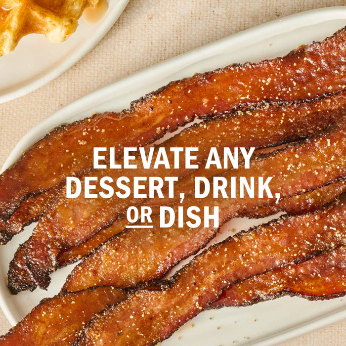 Image of candied bacon strips on a white plate, suggesting it can elevate any dessert, drink, or dish.