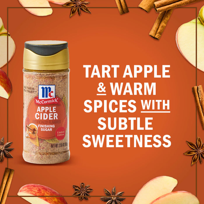 McCormick Apple Cider spice blend is featured against a background of apples, cinnamon sticks, and star anise, highlighting its tart apple and warm spice flavor with subtle sweetness.