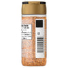 A bottle of McCormick seasoning with a gold lid and a nutrition facts label.
