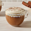 A waffle dessert topped with whipped cream and cinnamon, suggesting it can elevate any dessert, drink, or dish.