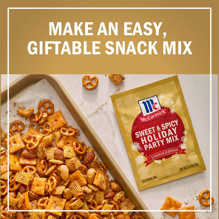 A McCormick Sweet &amp; Spicy Holiday Party Mix packet is displayed next to a baking sheet filled with a homemade snack mix of pretzels, nuts, and crackers, promoting an easy, giftable snack mix.