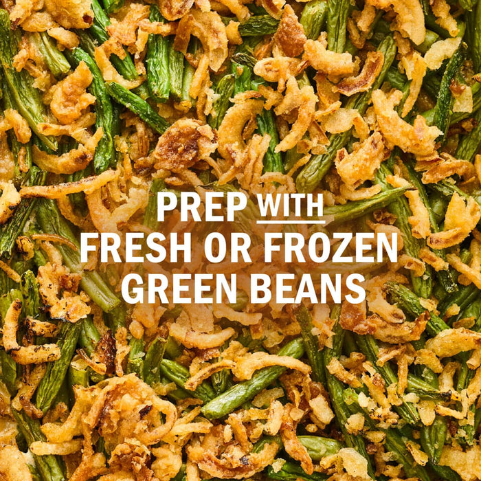 A close-up of green bean casserole with the text Prep with fresh or frozen green beans.