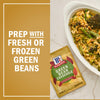 A McCormick Green Bean Casserole seasoning packet is displayed next to a prepared green bean casserole, emphasizing the option to use fresh or frozen green beans in the recipe.