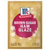 A packet of McCormick Brown Sugar Ham Glaze Mix.