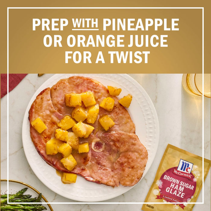 A plate of ham with pineapple chunks and a McCormick Ham Glaze packet, suggesting to prep with pineapple or orange juice for a twist.