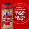 A container of McCormick Thai Style Chili Pepper Crushed with a label that says Complex flavor with intense long-lasting heat.