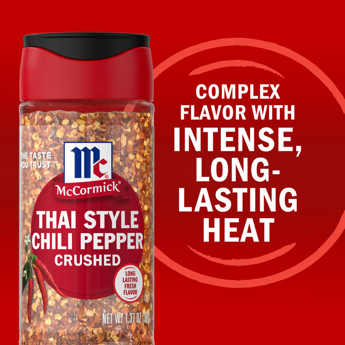 A container of McCormick Thai Style Chili Pepper Crushed with a label that says Complex flavor with intense long-lasting heat.