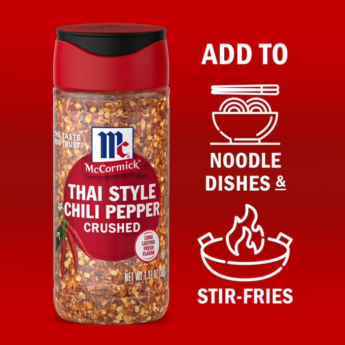 A jar of McCormick Thai Style Chili Pepper Crushed seasoning is shown with suggested uses for noodle dishes and stir-fries.