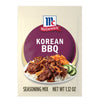 McCormick Korean BBQ seasoning mix package featuring a plate of Korean BBQ with rice kimchi and cucumber.