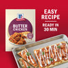 A McCormick Butter Chicken seasoning packet is displayed next to a flatbread pizza topped with butter chicken red onions and a white sauce highlighting the easy recipe and 30-minute preparation time.