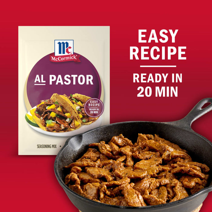 A package of McCormick Al Pastor seasoning mix is displayed next to a skillet of cooked Al Pastor meat highlighting the easy recipe thats ready in 20 minutes.