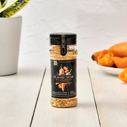 A spice jar labeled Me 2025 Flavor of the Year Aji Amarillo Seasoning with a 25th Edition sticker.