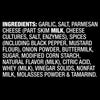 The image displays a list of ingredients including garlic salt parmesan cheese spices onion powder buttermilk sugar modified corn starch natural flavor citric acid whey vinegar solids nonfat milk molasses powder and tamarind.