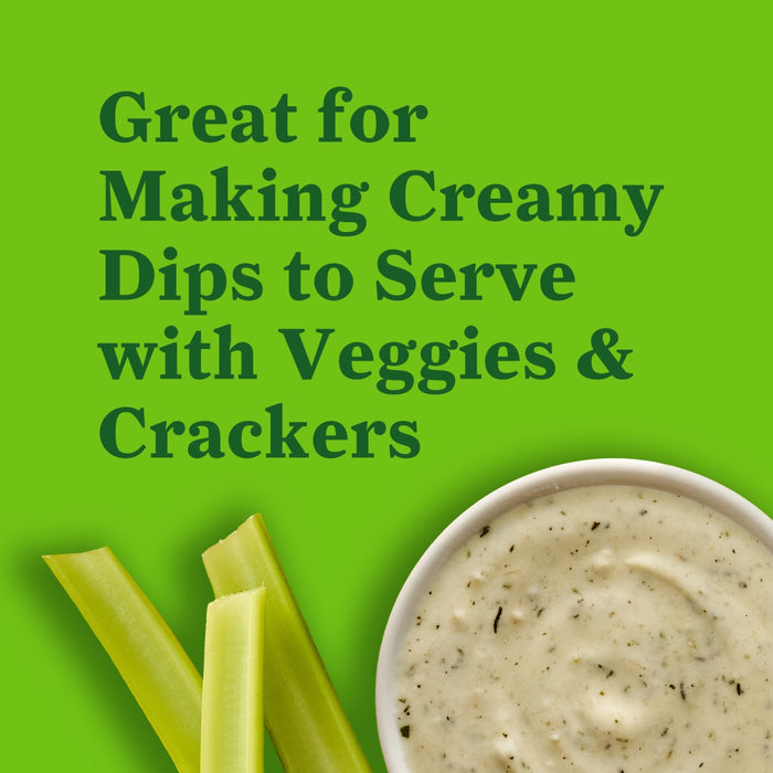 This image promotes a product that is great for making creamy dips to serve with veggies and crackers as shown with celery sticks and a bowl of dip.