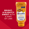 A bottle of McCormick Tortas Sandwiches Mayonnaise Dressing is featured on a red background alongside text describing it as bright and slightly sweet with a hint of lime.