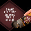 A hand shakes a bottle of Mccormick Grill Mates Bourbon &amp; Oak Seasoning Ground 3.37 Oz, with on-screen text instructing to use 1 to 2 tablespoons per pound of meat.