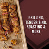 Grilled meat and red onion skewers on a baking sheet are generously sprinkled with Mccormick Grill Mates Bourbon &amp; Oak Seasoning Ground 3.37 Oz, with text highlighting its uses for grilling, tenderizing, and roasting.