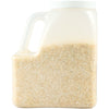 A plastic container with a handle is partially filled with rice.