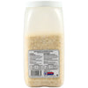 A container of Kirkland Signature grated Parmesan cheese is shown.