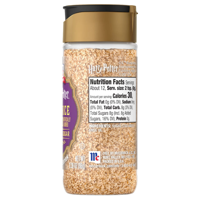 A clear plastic shaker bottle of Mccormick Slytherin Finishing Sugar Harry Potter 3.37 Oz with a gold and black cap, displaying nutrition facts and ingredients on its label.