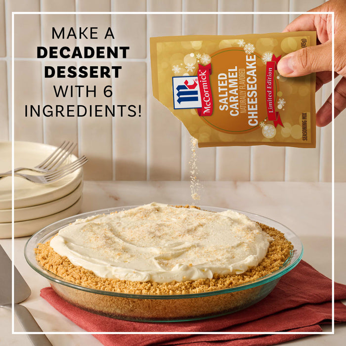 A hand sprinkles Mccormick Salted Caramel Cheesecake Seasoning Mix, 1.62 Oz over a decadent cheesecake with a graham cracker crust to show how to make a dessert with only six ingredients.